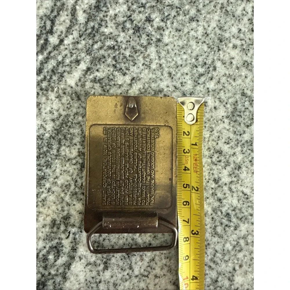 brass‎ belt buckle logos Bendix Corporation and Skagit Car Brake Equipment 1978